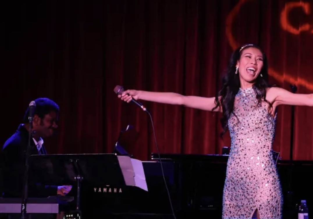 Setsuko Hata on stage with piano